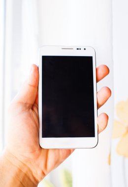 erkek eli beyaz samsung galaxy s2 düzenliyor