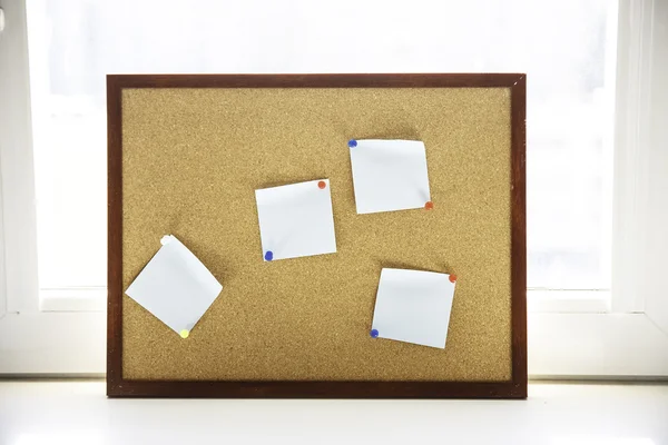 Desk with a clipped papers on it — Stock Photo, Image