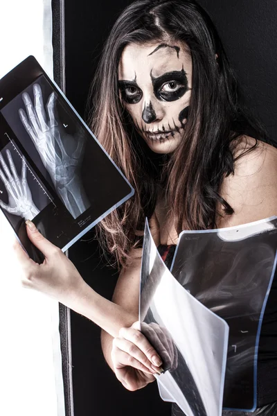 Zobmie girl with a few x-ray images — Stock Photo, Image