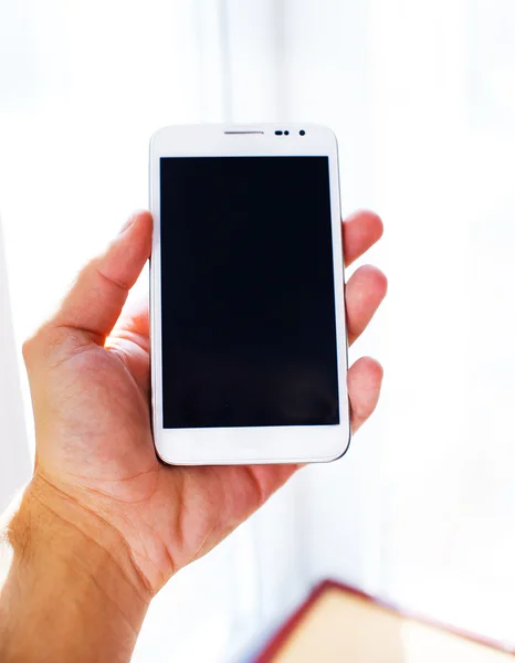 Male arm is holding samsung galaxy s2 — Stock Photo, Image