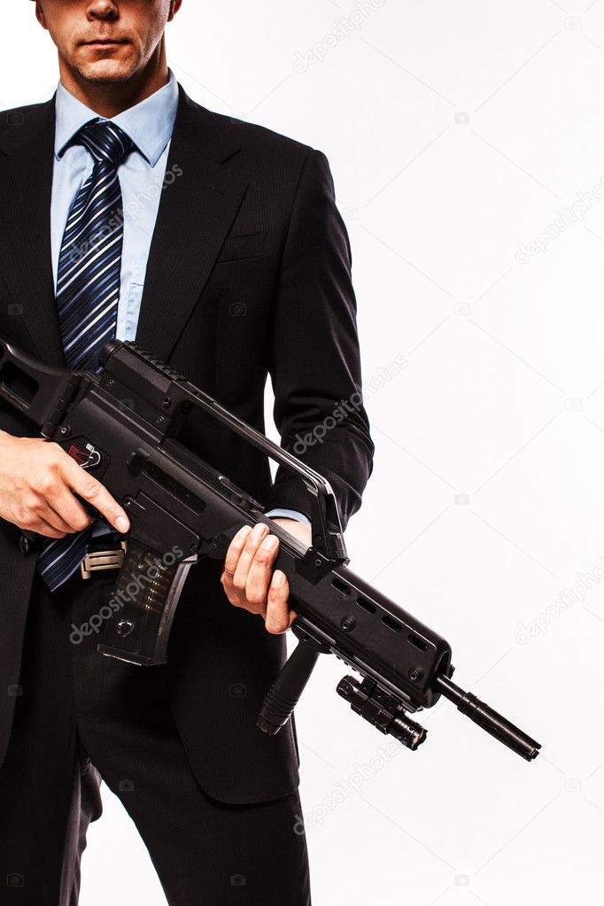 serious man with a gun