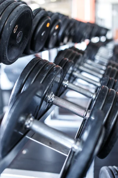 Row of a heavy dumbbells — Stock Photo, Image