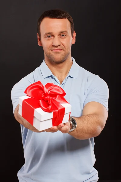 Man with gift box — Stock Photo, Image