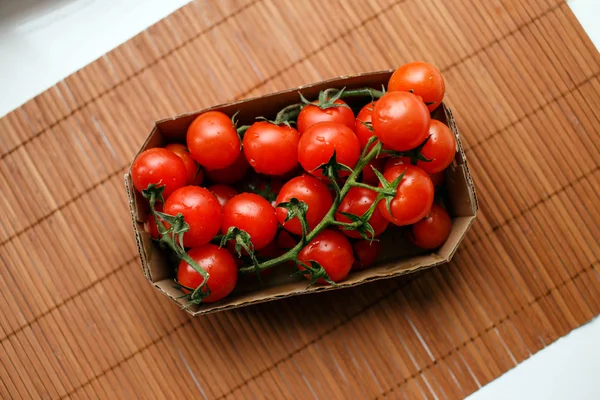 Cherry tomatoes on the table — Stock Photo, Image