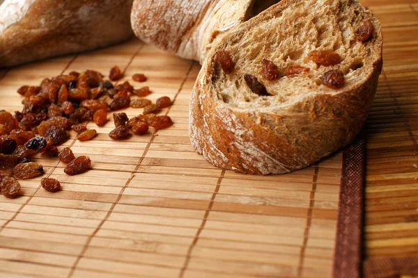 Composition of bread and risins — Stock Photo, Image