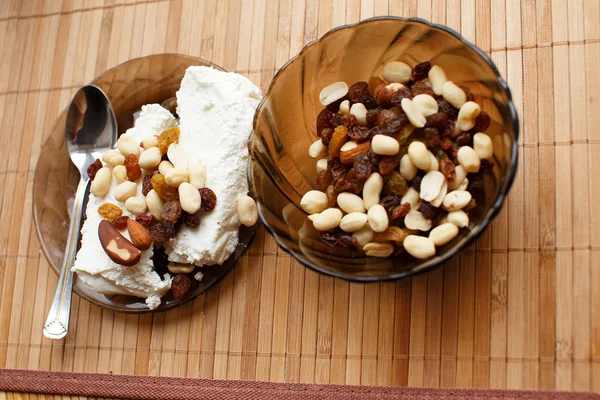 Tasty breakfast with nuts and raising — Stock Image Tasty breakfast with nuts and raising Stock Image