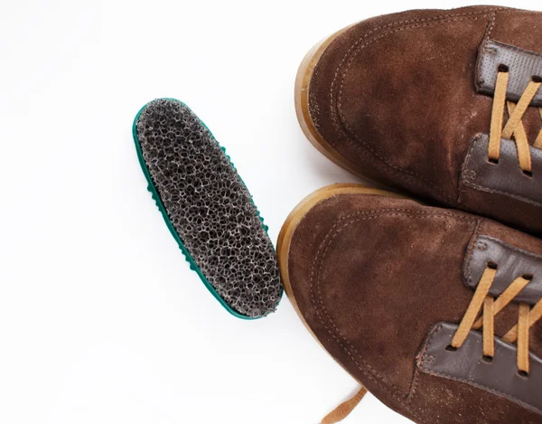 Spong i brązowy buty męskie — Zdjęcie stockowe
