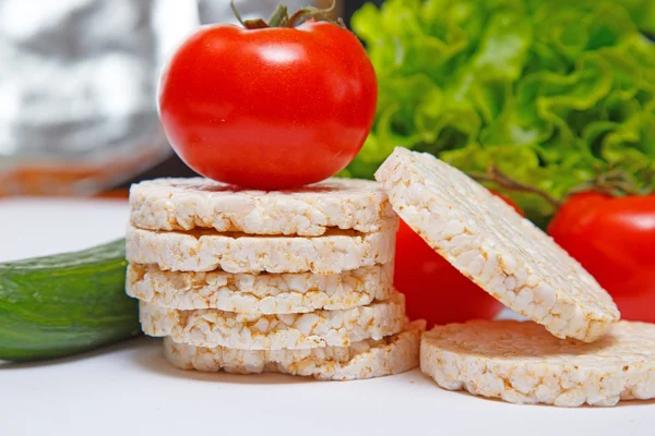 Fresh corn crackers and vegetables — Stock Photo, Image