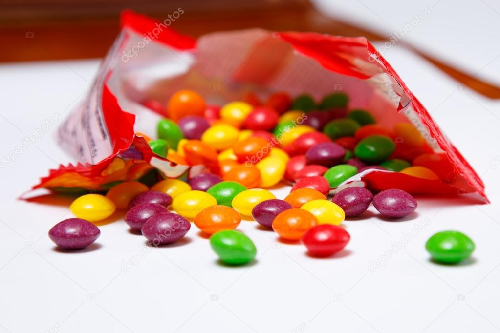 Openned pack with skittles in it
