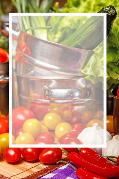 Vegetables in metallic cookware — Stock Photo, Image