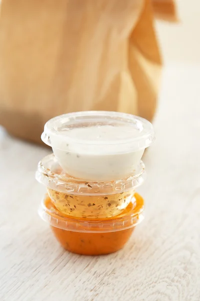 Three sauces on the top of each other — Stock Photo, Image