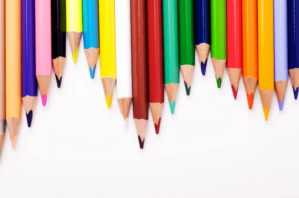 Bir dalga şeklinde farklı renkli kalemler Stok Resim