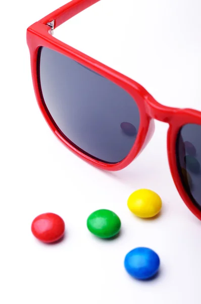 Bonbons und Sonnenbrillen — Stockfoto