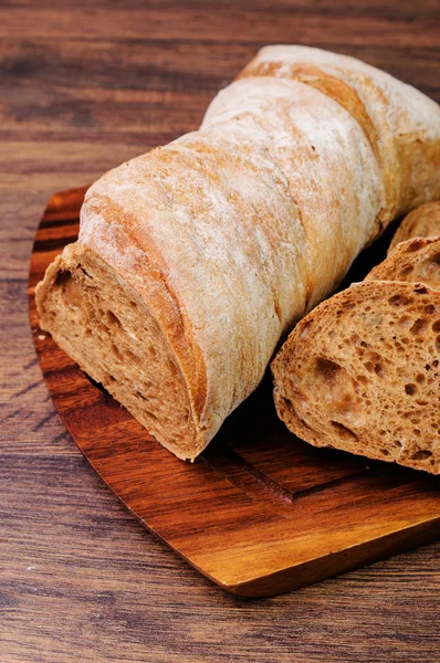 Italian bread cut into two halves — Stock Photo, Image