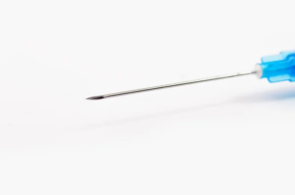 Uma foto de close-up de uma agulha de seringa — Fotografia de Stock