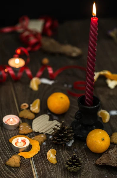 Candles and mandarines — Stock Photo, Image