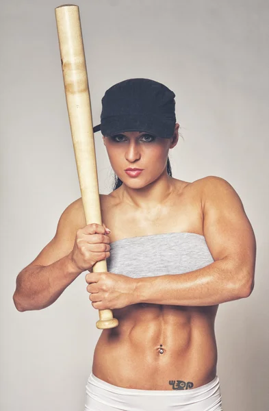 Woman with baseball bat — Stock Photo, Image