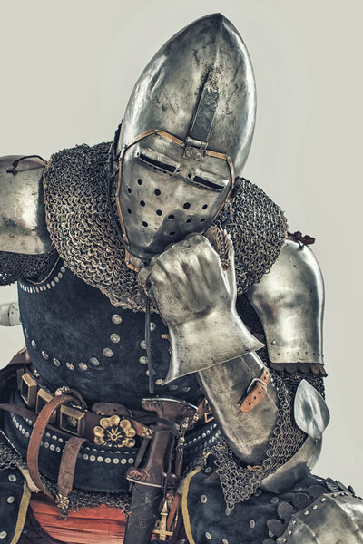 Image of old knight with weapon