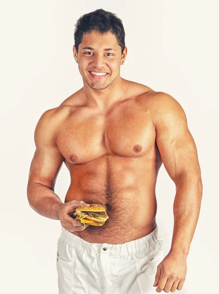 Hamburger ile adam — Stok fotoğraf