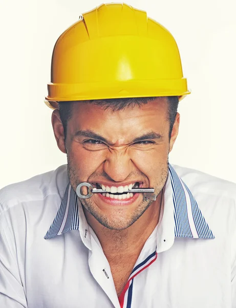 Ingeniero con llave de metal —  Fotos de Stock