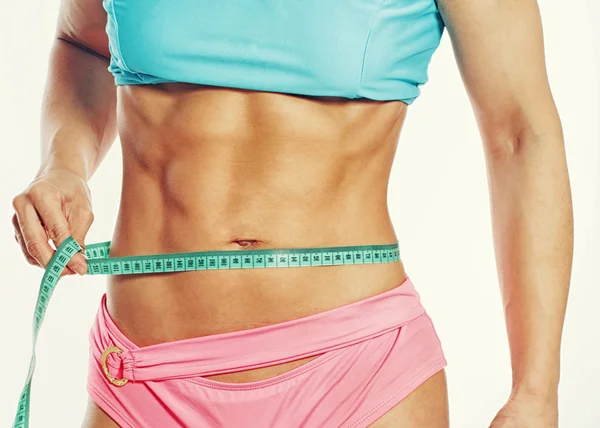 Chica fitness con estómago seductor —  Fotos de Stock