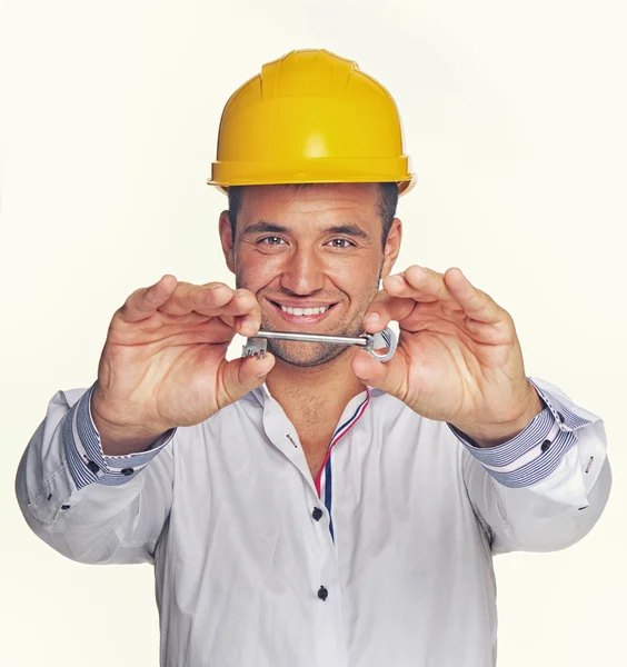 Ingeniero con llave de metal —  Fotos de Stock