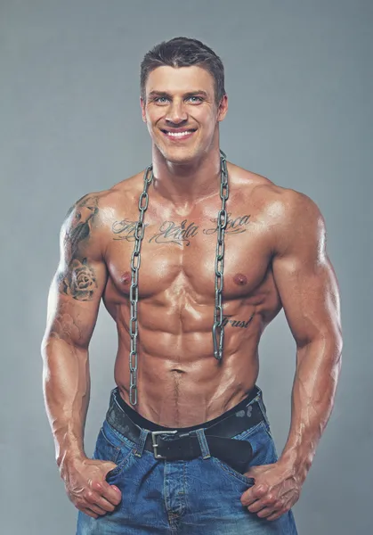 Muscular man with chain — Stock Photo, Image