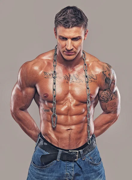 Muscular man with chain — Stock Photo, Image