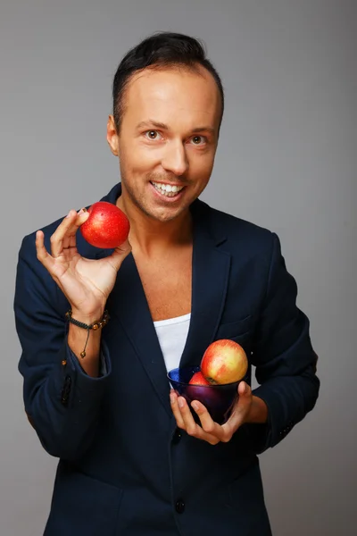 Man and apples — Stock Photo, Image