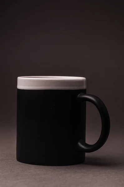 Schwarze Tasse — Stockfoto