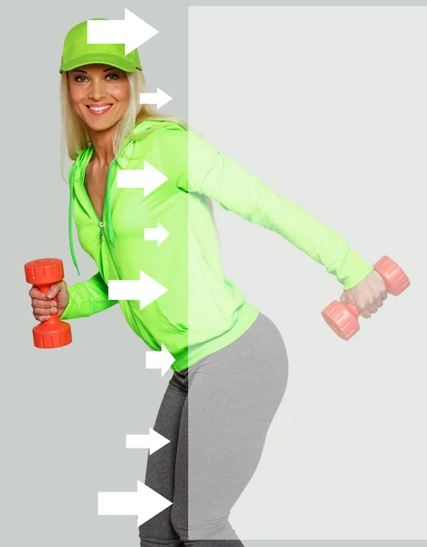 Blondie with dumbbells — Stock Photo, Image