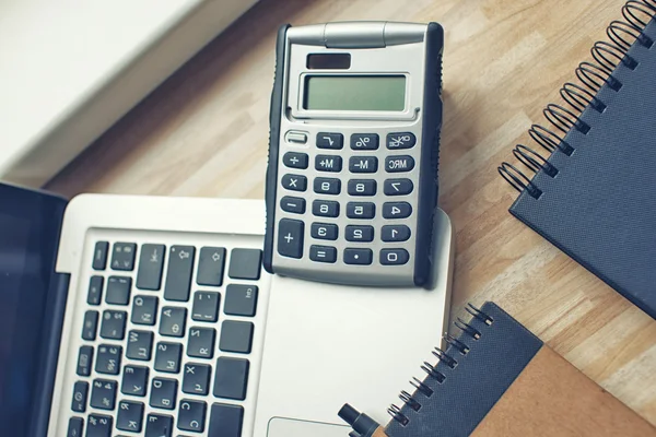 Laptop and notepad — Stock Photo, Image