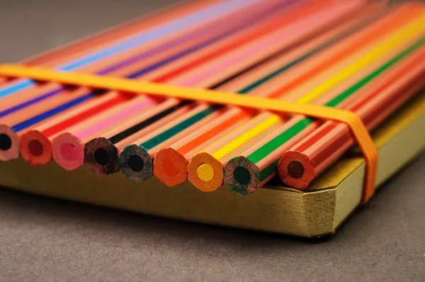 Pencils with notebook — Stock Photo, Image