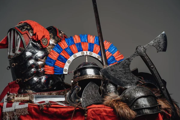 Armor and weapons of scandinavian warrior and roman soldier — Stock Photo, Image