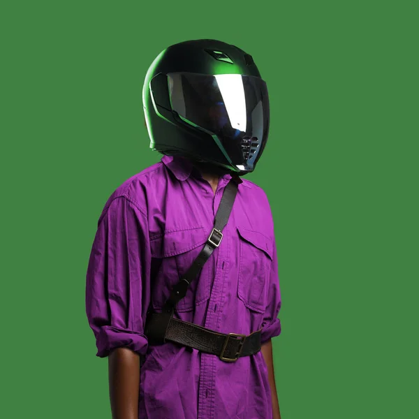 Woman with motorcycle helmet dressed in bizarre clothing — Stock Photo, Image