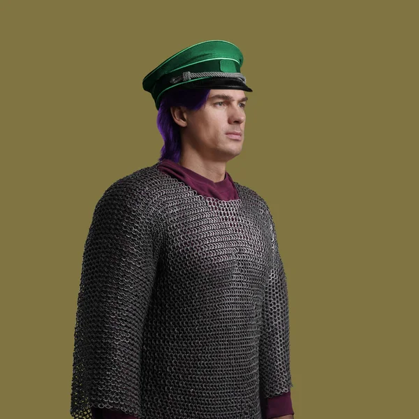 Military man dressed in chain mail posing against colorful background — Stock Fotó