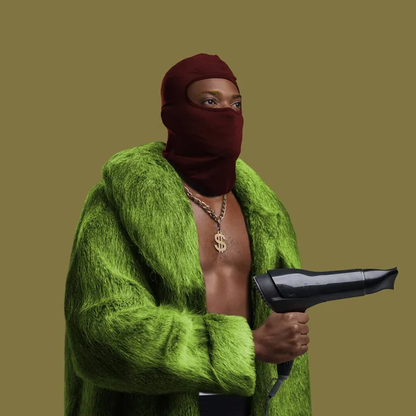 African man with balaclava posing against colorful background — Stock Fotó