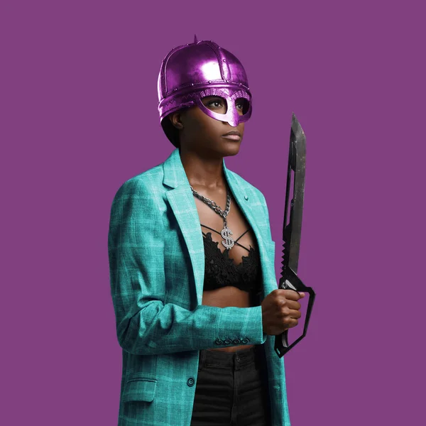 African woman with helmet and knife against pink background — Φωτογραφία Αρχείου