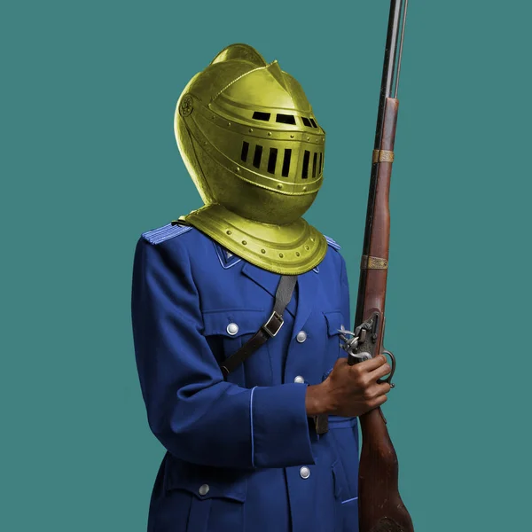 Stylish black woman with knight helmet against green background — Foto de Stock