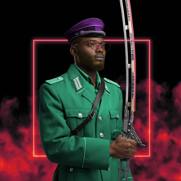 Military black man holding sword against colorful background