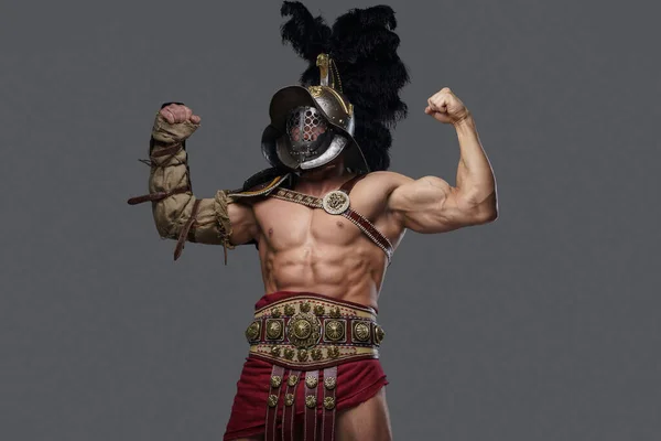 Strong antique gladiator with naked torso isolated on gray background — Stock Photo, Image