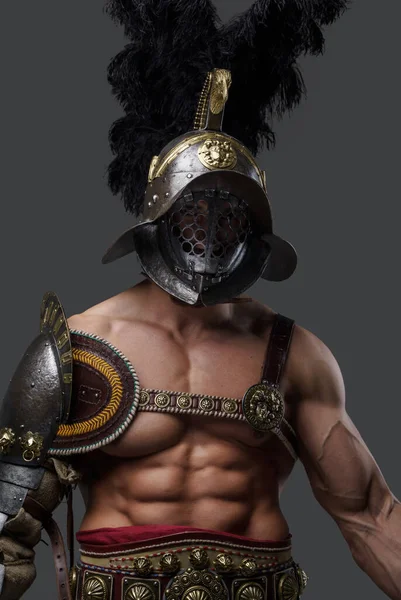 Naked colosseum warrior dressed in light armor and plumed helmet — Stock Photo, Image
