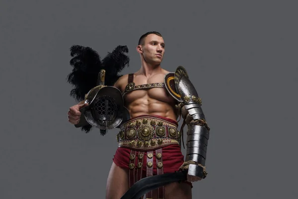 Ancient arena fighter with plumed helmet and gladius — ストック写真
