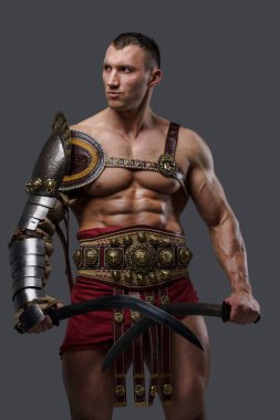 Roman gladiator dual wielding swords against grey background