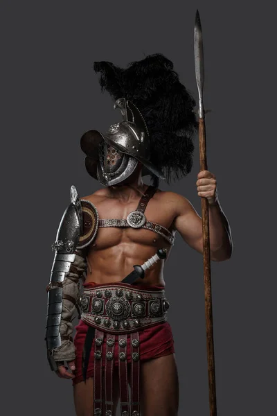 Antique roman warrior with spear and plumed helmet — Stockfoto