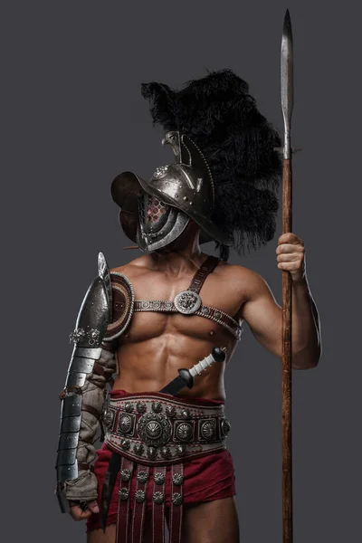 Antique roman warrior with spear and plumed helmet — Stockfoto