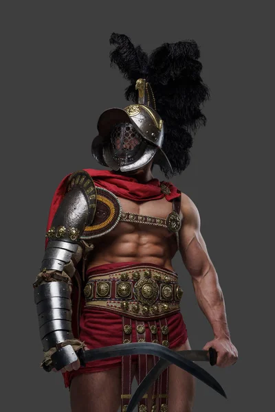 Violent roman gladiator with helmet and twin swords — Stock Photo, Image