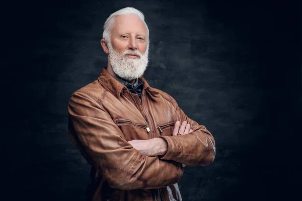 Confident elderly man dressed in brown leather jacket — 스톡 사진
