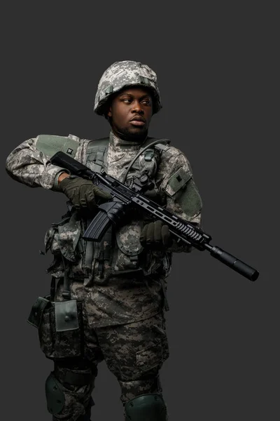 Combative African Soldier Serious Face Holding Rifle Looking Away Dark — Stock Photo, Image