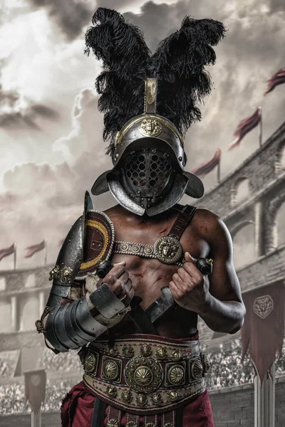 Shot African Gladiator Dressed Armor Helmet Posing Two Swords Arena — Fotografia de Stock